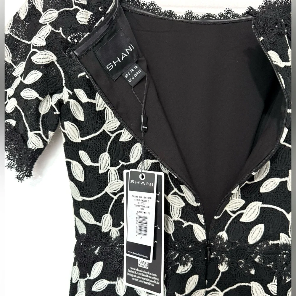 Shani NWT Black/White Two Tone Lace Bateau Neck Ruffle Hem Dress - Picture 5 of 10
